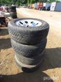 4 245/65 R17 TIRES ON RIMS