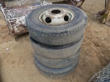4 ST235-85-16 TIRES WITH WHEELS
