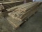 BIG PILE OF ROUGH CUT LUMBER