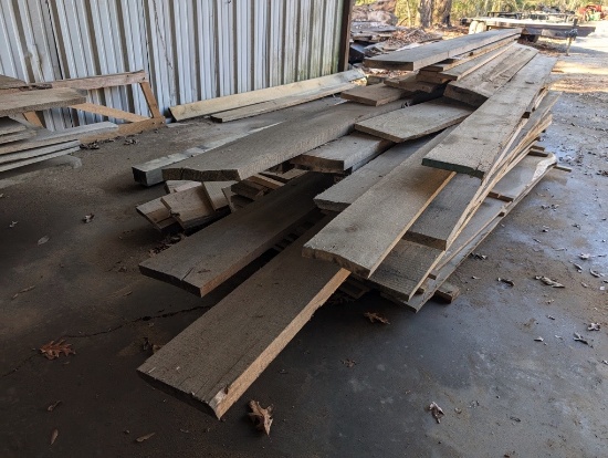 STACK OF OAK BOARDS