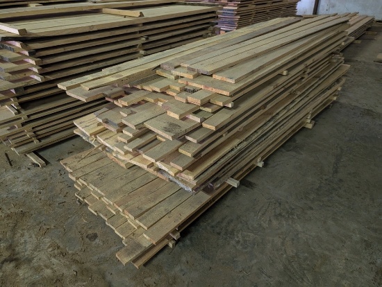 BIG PILE OF ROUGH CUT LUMBER