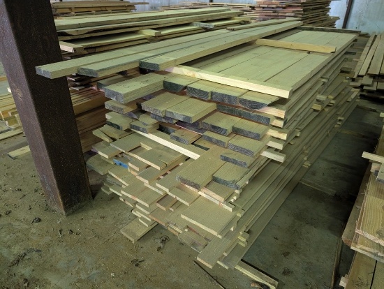BIG PILE OF ROUGH CUT LUMBER