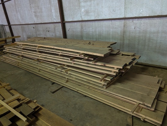 PILE OF ROUGH CUT LUMBER