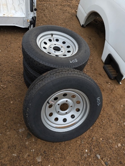 (4) NEW ST 205/75 R15 TIRES ON RIMS