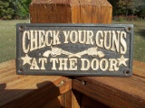 Cast Iron Please Check Your Guns At The Door Sign Plaque