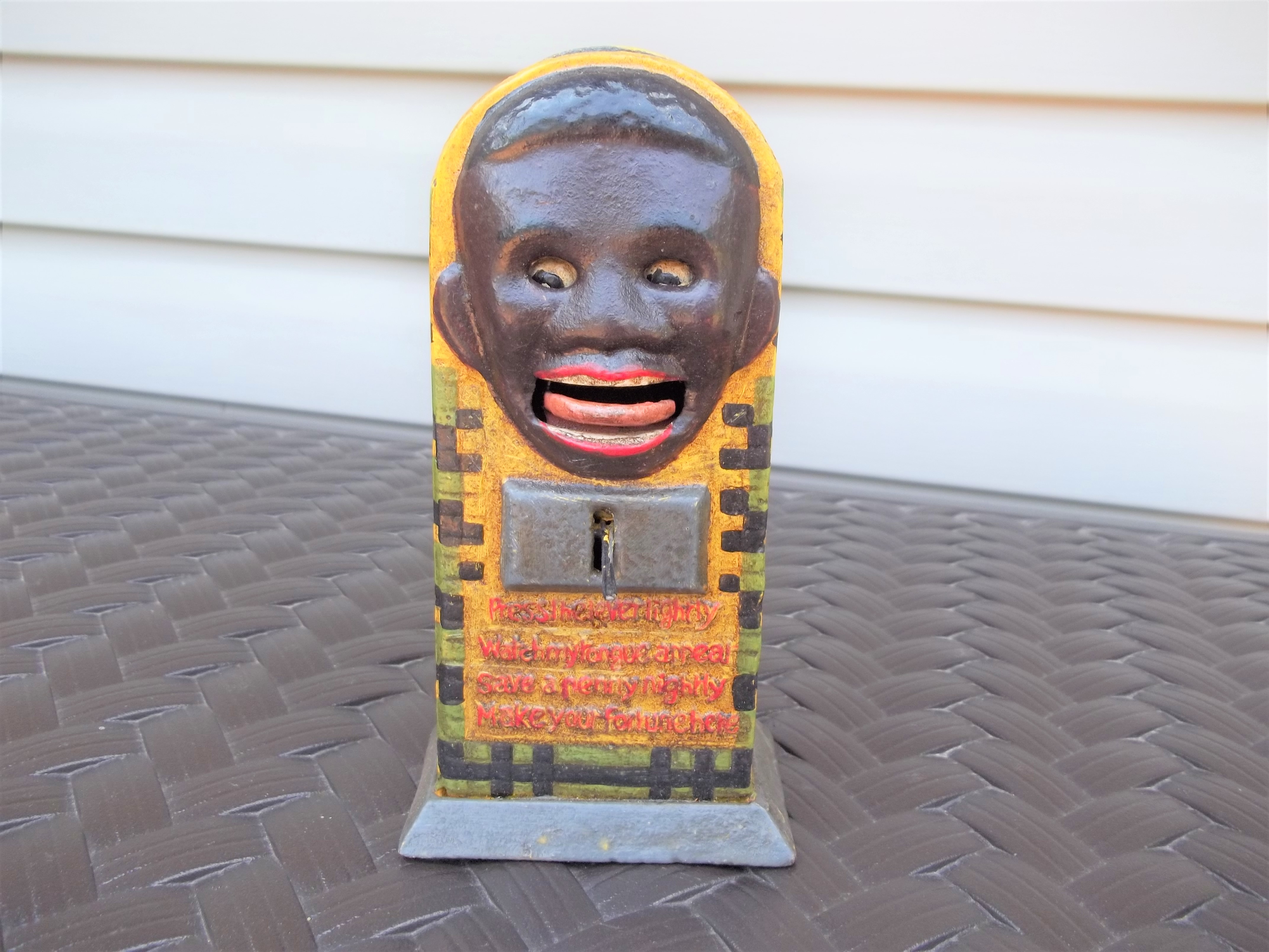 Cast Iron Black Face Fortune Mechanical Coin Bank | Proxibid