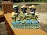 Cast Iron Hubley Black Americana 3 Boys on Fence Eating Melon Doorstop