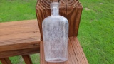 Old Vintage Glass Flask Bottle with German Stomach Bitters Etches on It