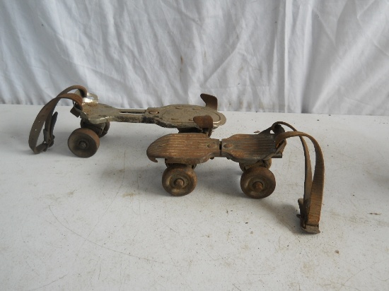 Unmatched Pair of Roller Skates