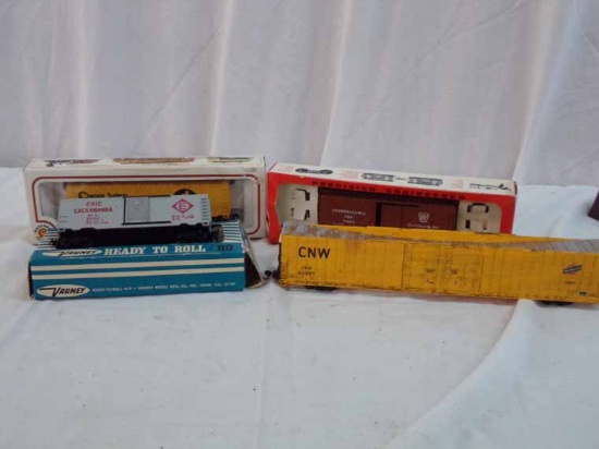Lot of 4 "HO" Includes Chessie System Boxcar, Erie Lackawanna Boxcar, PRR Boxcar & CNW Excess Height