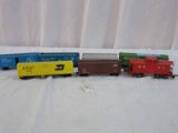 Lot of 7 Includes American Flyer Reading #630 Caboose, 2 Great Northern, 2 Burlington Northern, Milw
