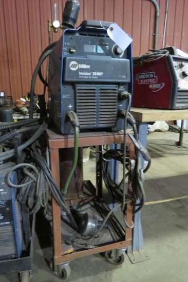 Miller Invision 354MP DC Inverter Arc Welder W/Stand, Helmet & Bottle