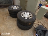 4 Michelin P265/70R17 w/ Cadillac Rims