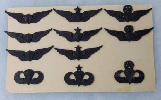 11 pcs. Post Vietnam War Era US Army Subdued Breast Badges w/ Collector Display Cardboard