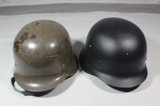 Lot of 2 German Combat Helmets.  1 Reproduction. 1 Possible Foreign Issue.