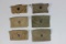 Lot of 6 US WW2 First Aid Bandage Pouches. Some W/ Contents.