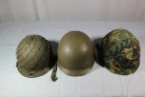 Lot of 3 Helmets. 2 Rear Seam Swivel Bale Vietnam Era Helmets 1 W/ Cover. West German M1 Helmet.