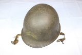 Late US WW2 Rear Seam Swivel Bale M1 Helmet. W/ Sewn Straps & Painted Rank Insignia. No Liner.