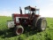 IH Model 1066 Diesel Tractor, Cab, 38 Inch Rubber, Hub Duals, Rock Box, 3 P