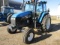 1998 New Holland Model TS-110 Two Wheel Drive Turbo Diesel Tractor, Deluxe