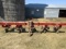 IH Model 133 Four Row Wide 3 Point Danish Tooth Cultivator