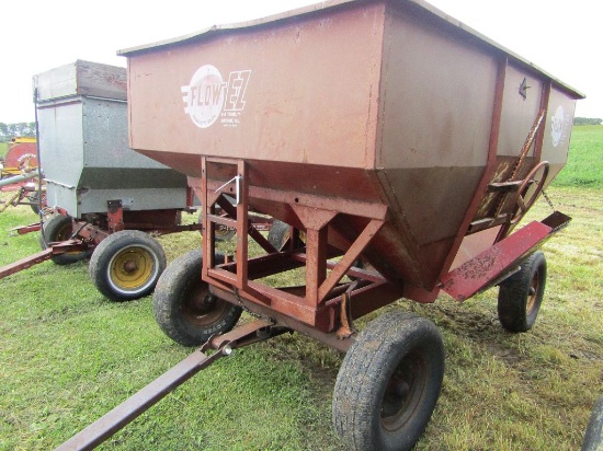 EZ Flow Model 220 Gravity Box on New Holland Four Wheel Wagon