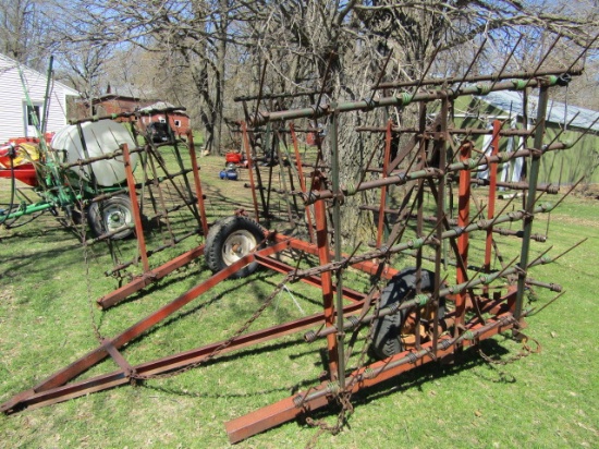 Four Section Tine Tooth Harrow with Lindsey Lever Sections on Transport