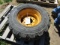 252-524. 12.5 X 16.5 Skid Loader Tire & 8 Hole Rim, Believed to be John Deere, Sales Tax Applies