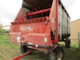 206-259. Gehl 980 16 FT. Vari-Sweep Forage Box on HD Unverferth Four Wheel Wagon, Ext. Pole