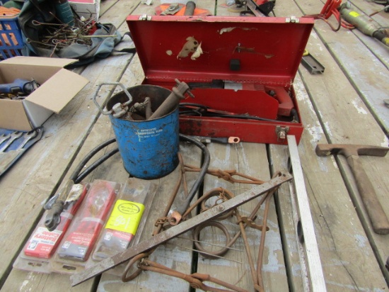 801. Lot Includes: Conibear Trap, Milwaukee Electric Sawz-All, Battery Cable, 2 FT. Level, & Misc.