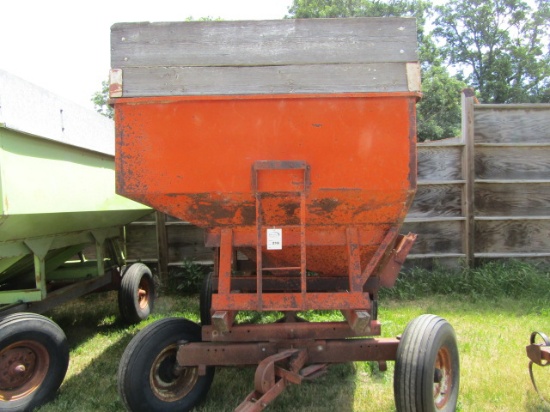 218. 200 Bushel Gravity Box with Wood Extensions on Factory Wagon