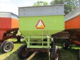 217. 200 Bushel Gravity Box with Metal Extensions on New Holland Wagon, Ribbed Implement Tires