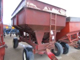 793. 348-834. 300 Bushel Gravity Box on Factory Four Wheel Wagon, T/ST3