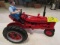 739. Ertl Farmall H with Added Driver
