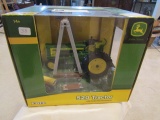 709. Ertl John Deere 520 Restoration Tractor with Accessories in Box