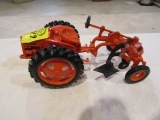 749. 1948 Allis Chalmers Model G with Plow, Plastic and Metal