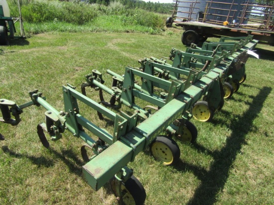 823. John Deere RM 4 Row Wide 3 Point Cultivator