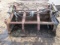 737-A. Shop Built 64 Inch Skid Loader Bucket with 4 Tine Hydraulic Grapple