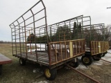 331. G Craft 9 X 16 FT. Steel Bale Throw Rack on Harms HD four Wheel Wagon