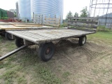 1661. 8 X 16 Wooden Flat Rack on MN 7 Ton Four Wheel Wagon
