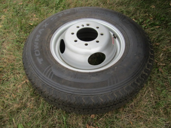 925-A. ST 235/80R/16 Tire on 8 Hole HD Rim, Fits Felling Flat Bed Trailer