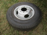 925-A. ST 235/80R/16 Tire on 8 Hole HD Rim, Fits Felling Flat Bed Trailer