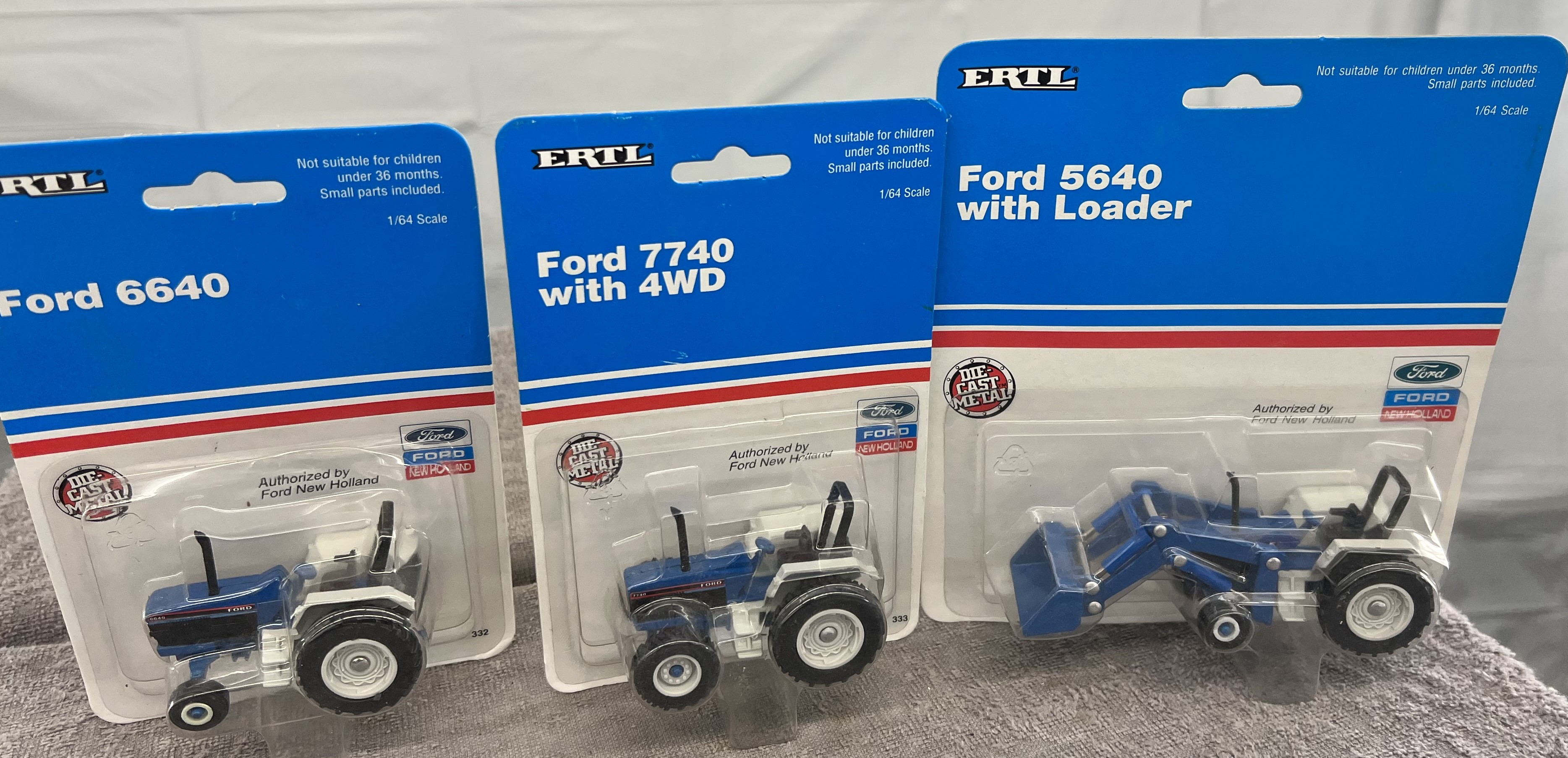 3) 1/64 Ford tractors, 6640, 7740, and 5640 with | Proxibid