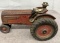 Cast Iron Oliver tractor with man, Approx. 7 ½”