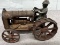 Cast Iron tractor with man, Approx. 6”