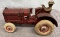 Arcade McCormick-Deering tractor with man, Approx. 7”