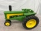 1/16 John Deere 2 Cylinder tractor, metal rims, repaint, no box