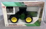 1/32 John Deere 8960 4WD battery operated tractor, box has water damage