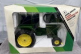 1/16 John Deere radio controlled tractor, box has wear