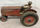 Cast Iron Oliver tractor with man, Approx. 7 ½”